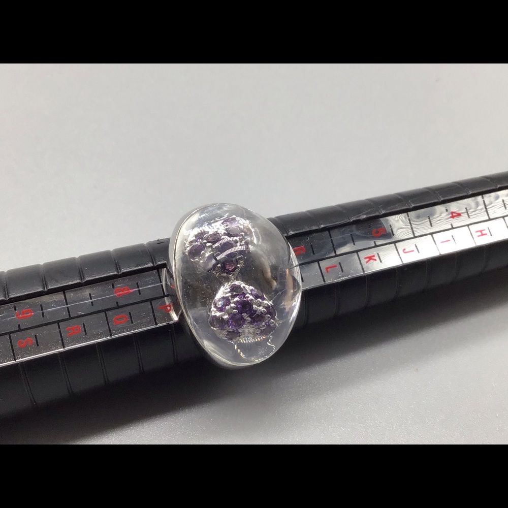 Sterling silver crystal and amethyst ring.